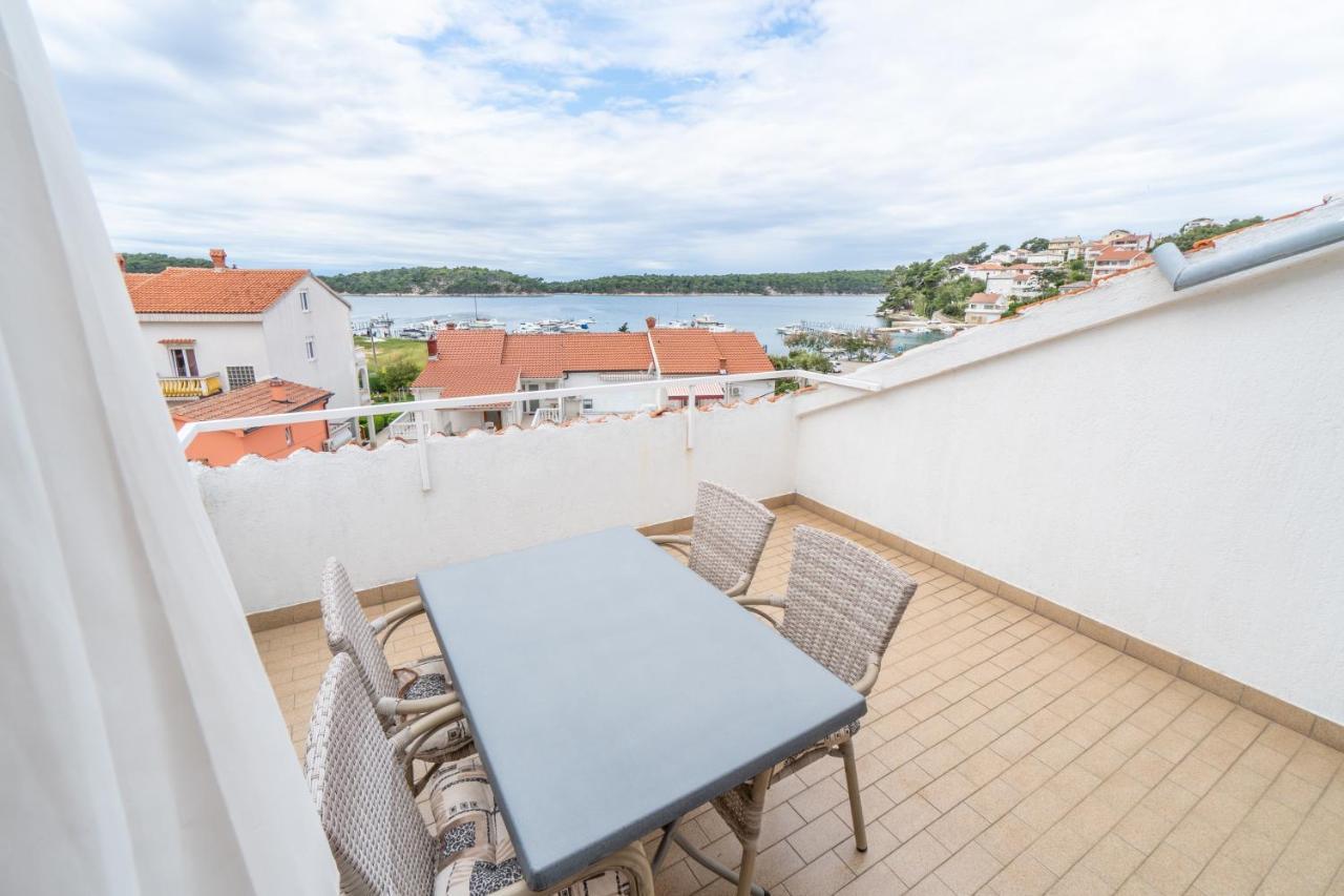 Apartments And Rooms By The Sea Palit, Rab - 5010 Exterior photo